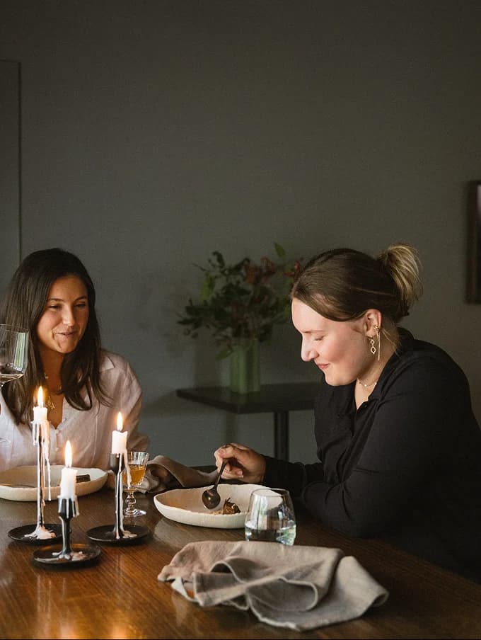 Guests dining in the Many Little private dining room