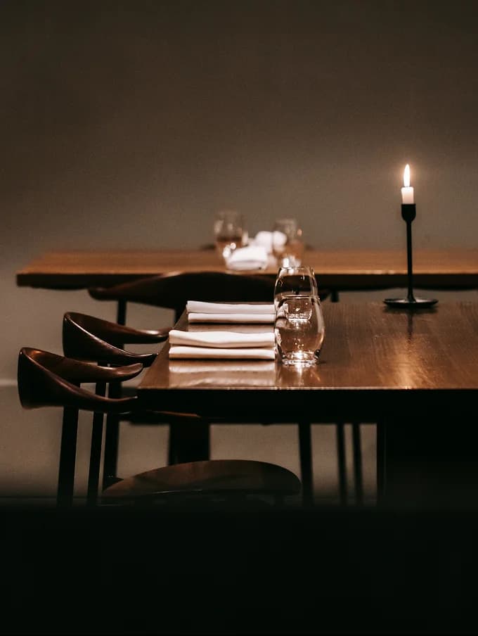 Guests dining in the Many Little private dining room