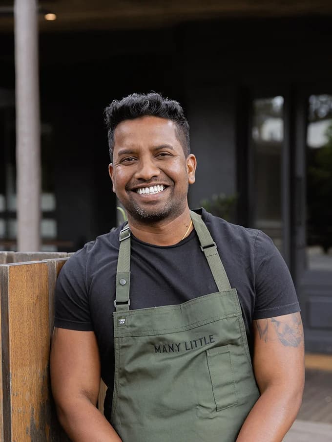 Chef Gayan Pieris preparing a dish in the Many Little kitchen
